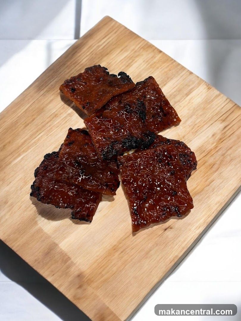 Grilled Meat Slices on Wooden Board