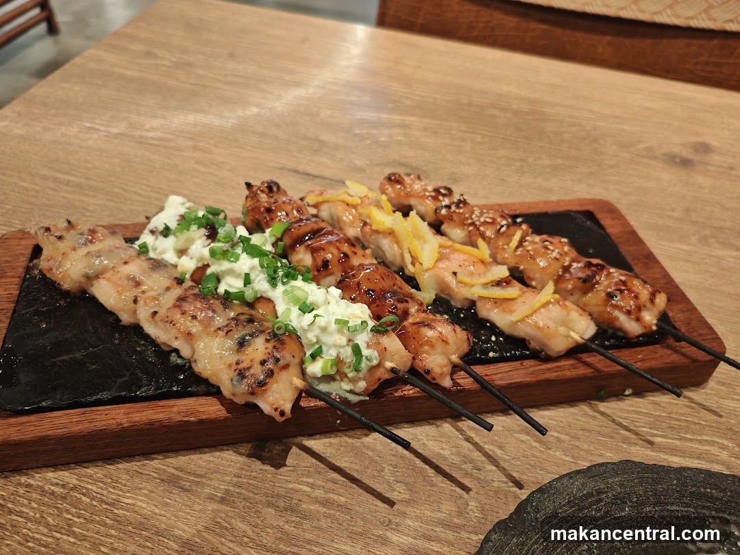 Grilled skewers on slate board