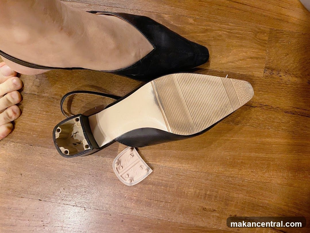 Shoe Soles on Wooden Floor