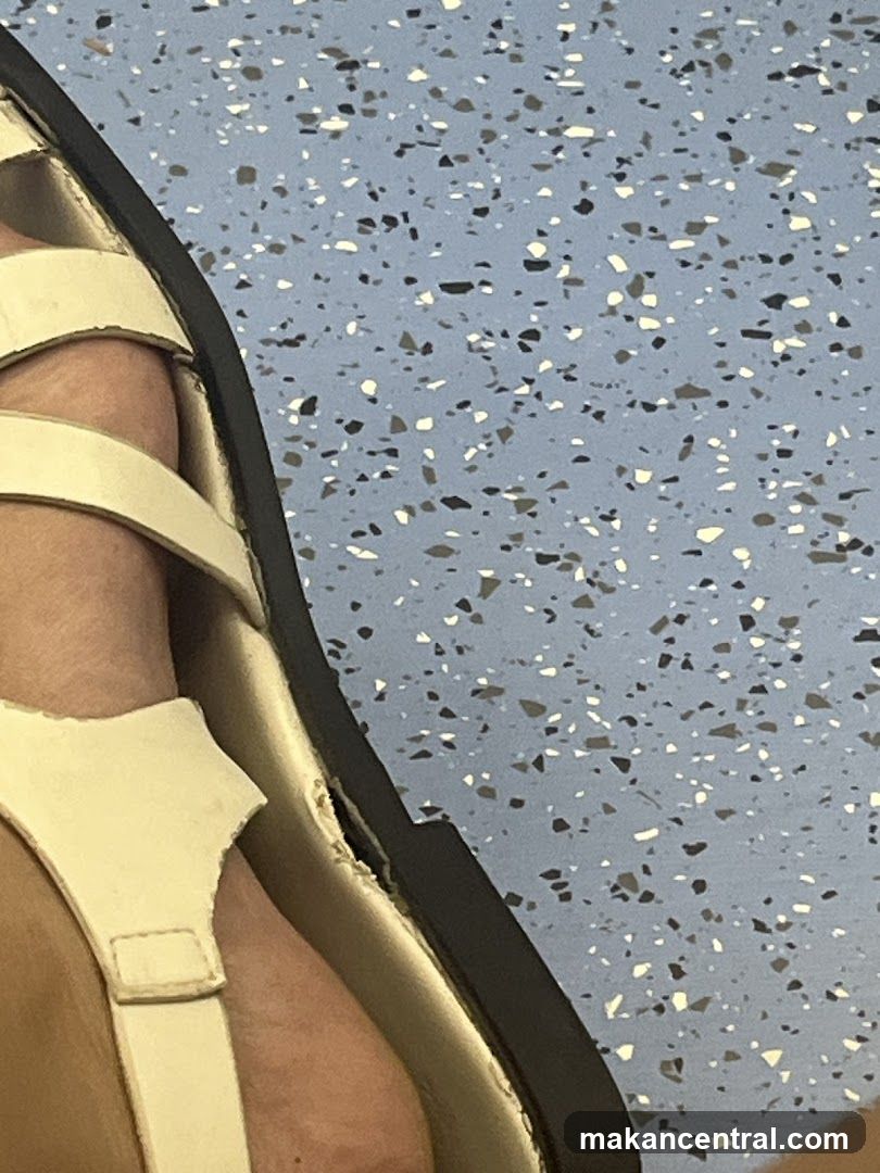 Close-up of Footwear on Speckled Floor