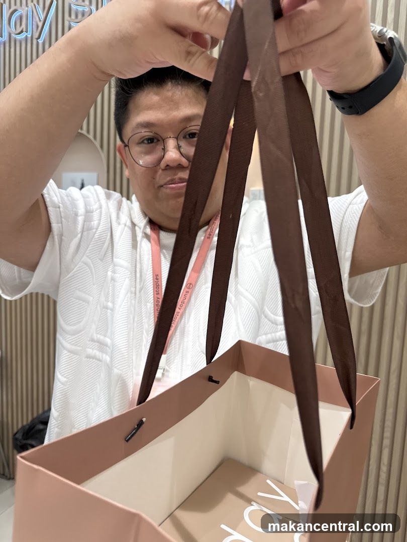 Person holding shopping bag