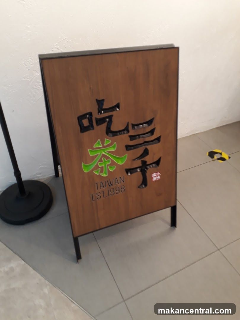 A wooden sign on an easel