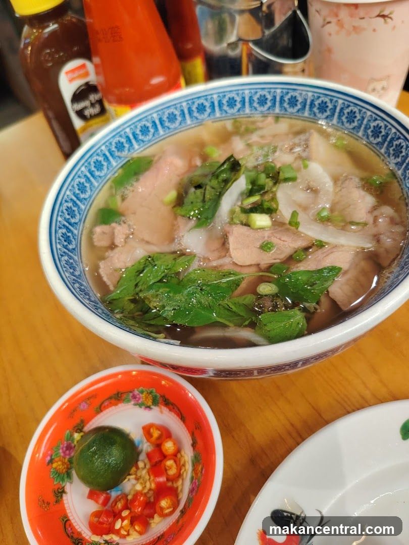 Bowl of Pho with Side Dishes