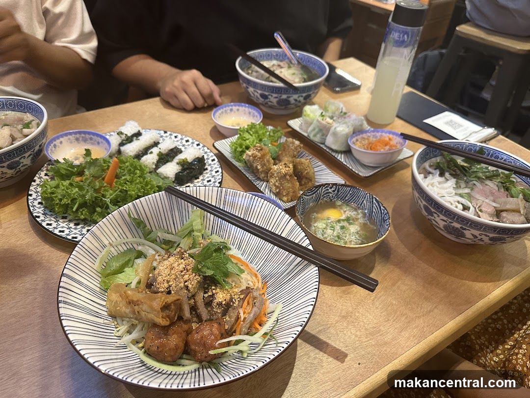 Dining table with Vietnamese dishes