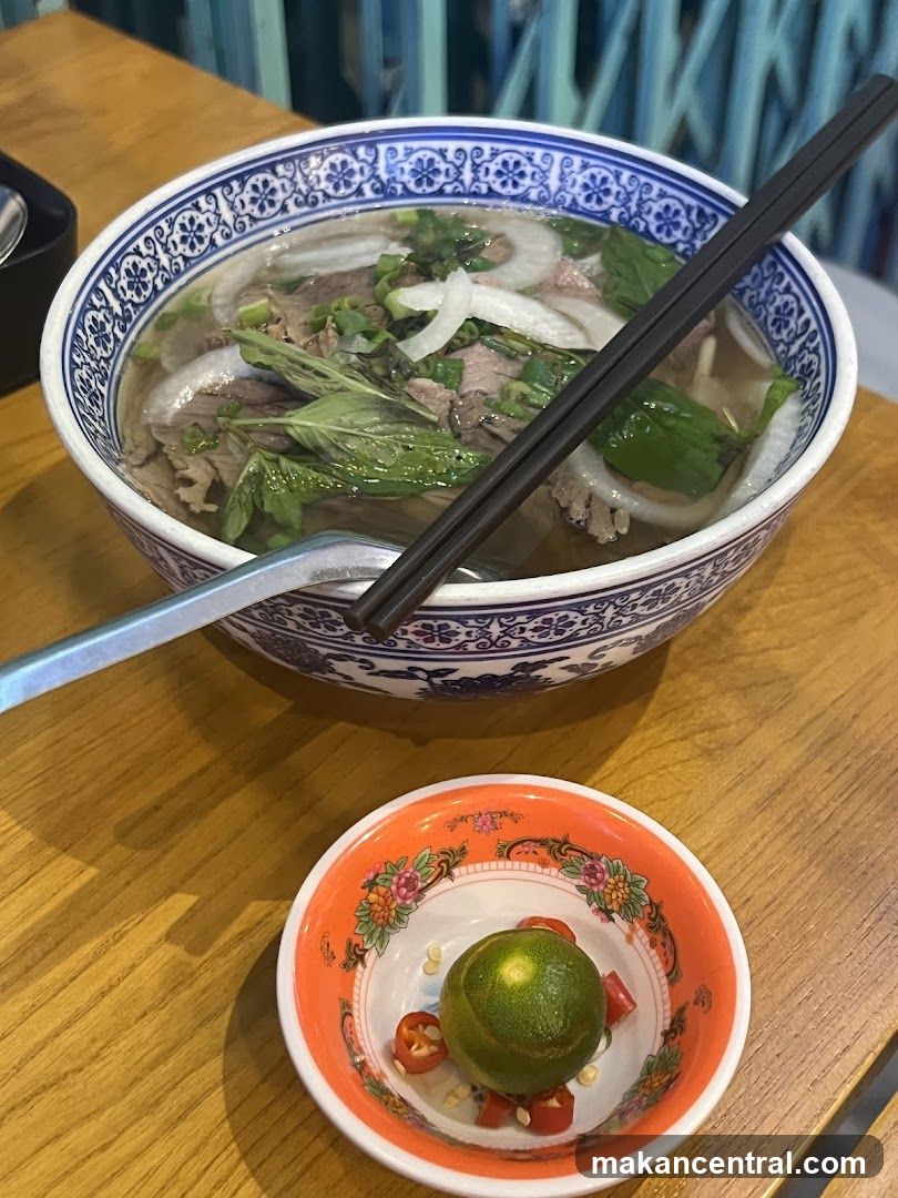 Pho bowl with condiments
