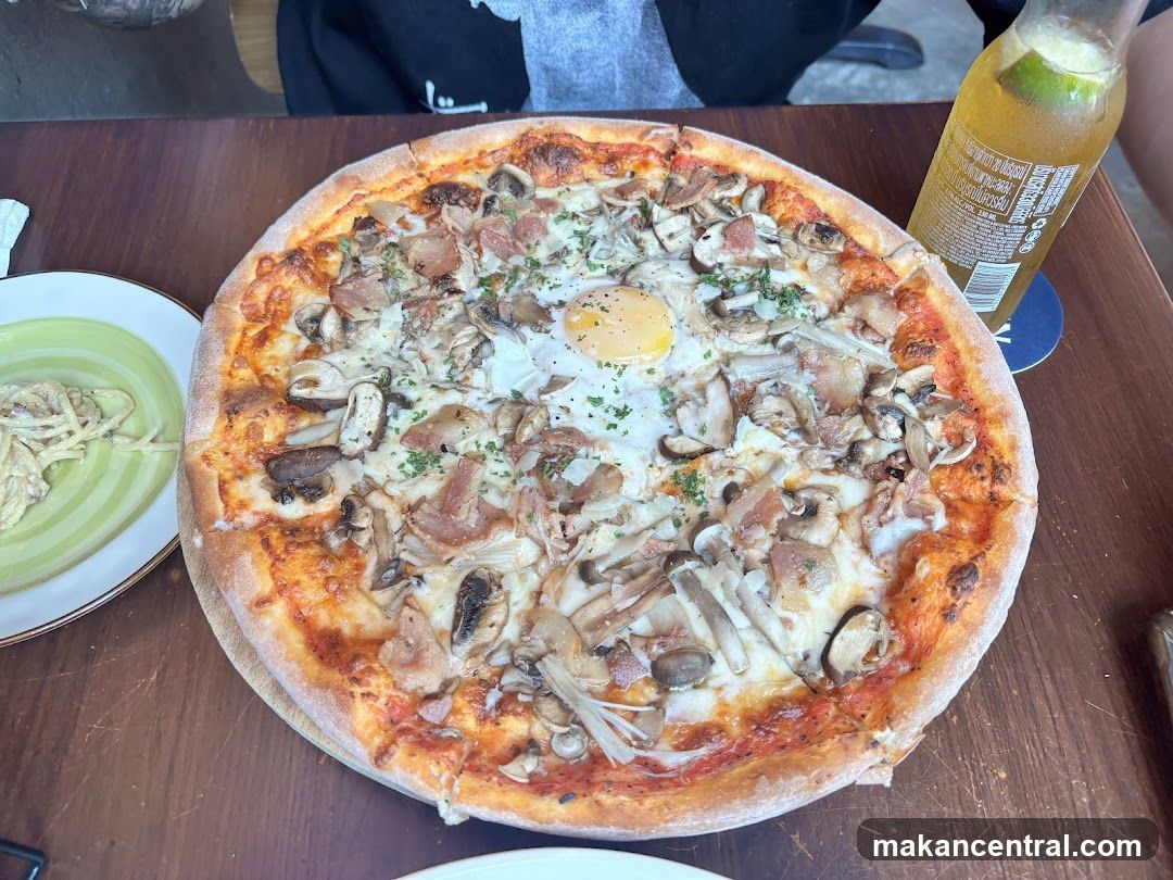 Pizza and beverage on table