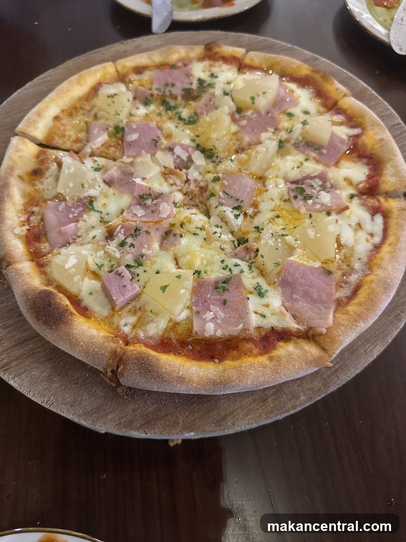 Pizza on wooden serving board