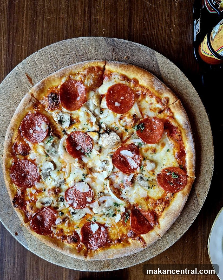 Pizza on wooden board