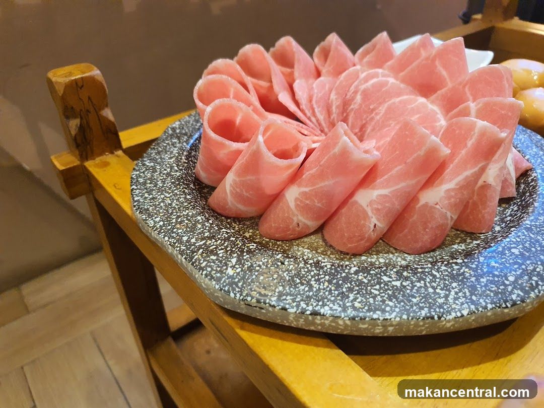 Raw Meat Slices on Plate