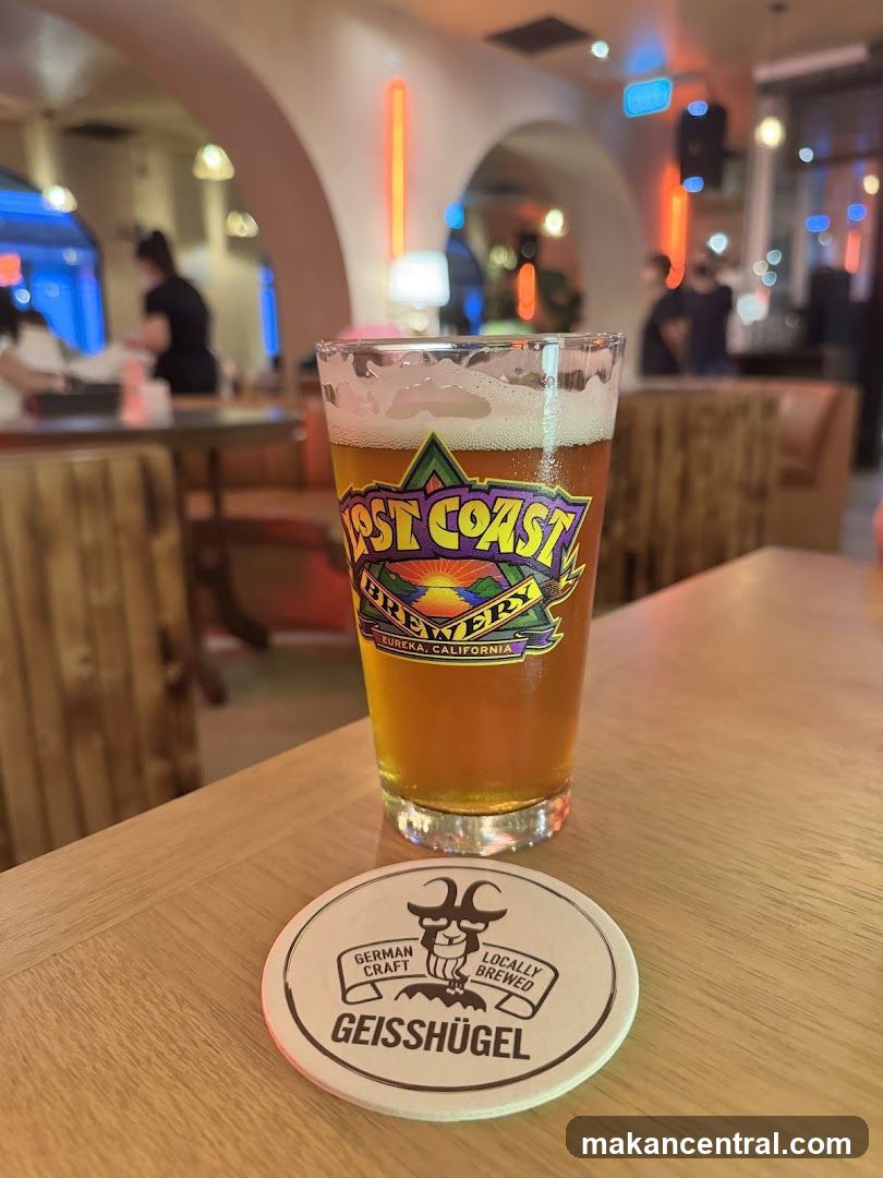 Beer Glass and Coaster in Bar Interior