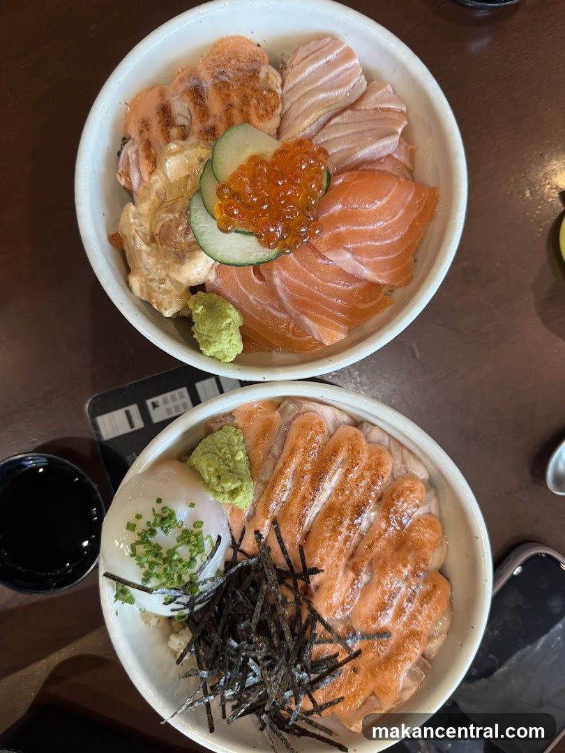 Two bowls of Japanese seafood rice bowls
