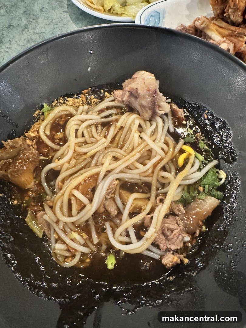 Noodle Dish in Black Bowl