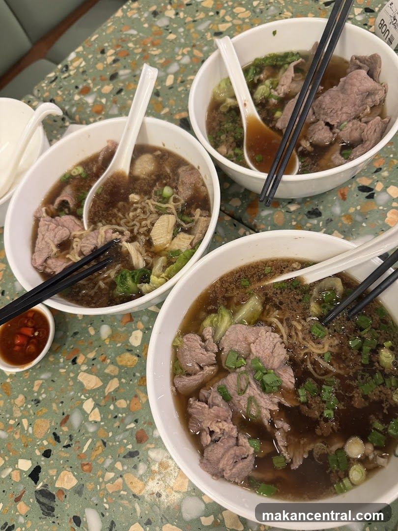 Bowl of Noodle Soup with Meat and Vegetables
