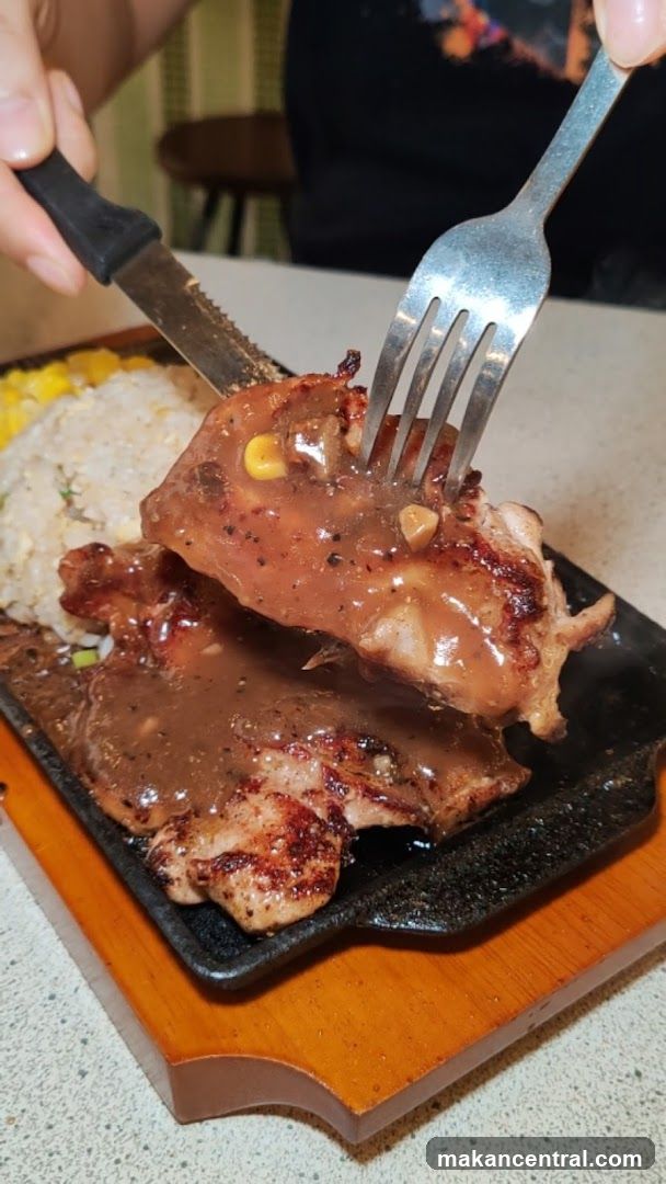 Food being cut with fork and knife