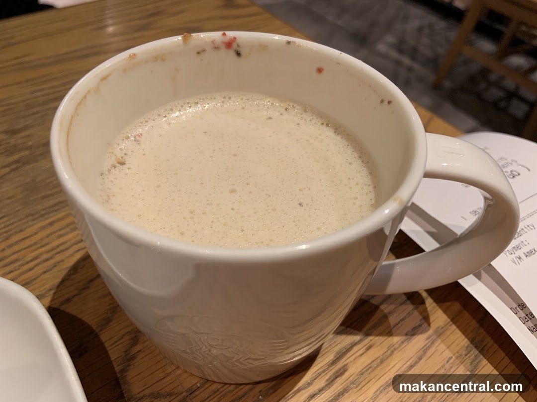 Starbucks Cup on Wooden Table