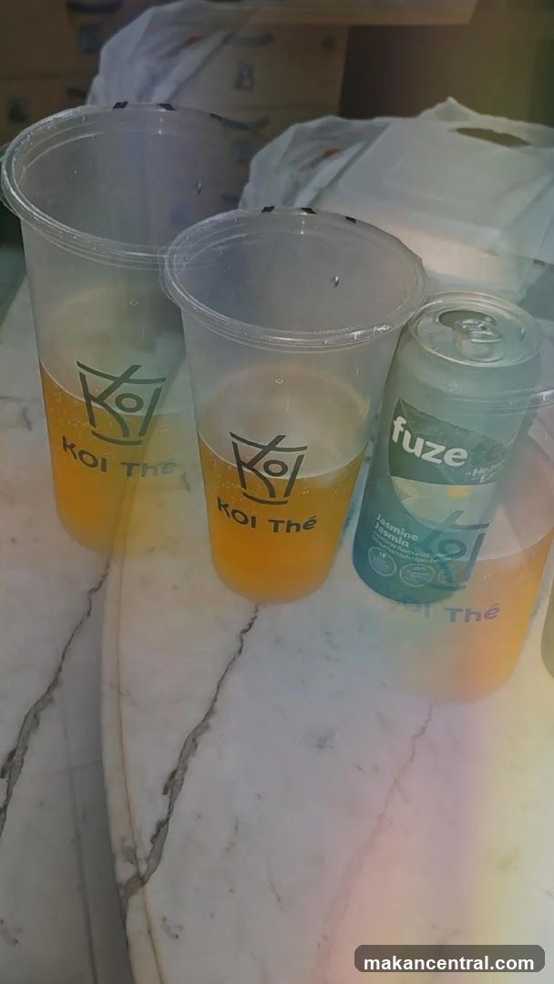 Koi Thé beverages on marble surface