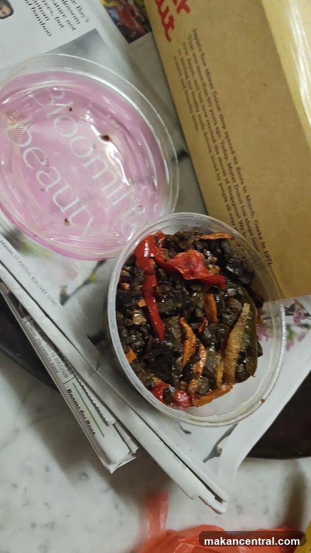 Food Container on Newspaper