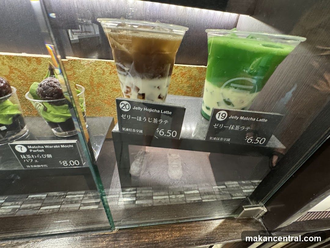 Coffee and dessert display in glass case