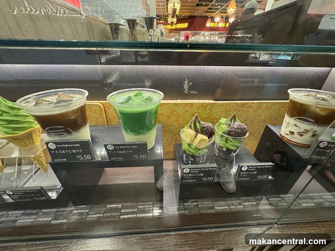 Coffee and dessert display in a café