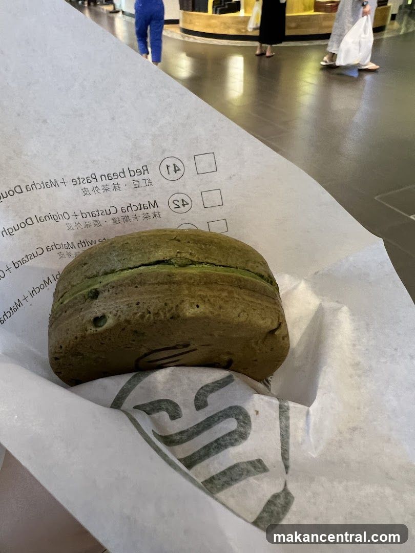 Matcha Donut on Paper Wrapper