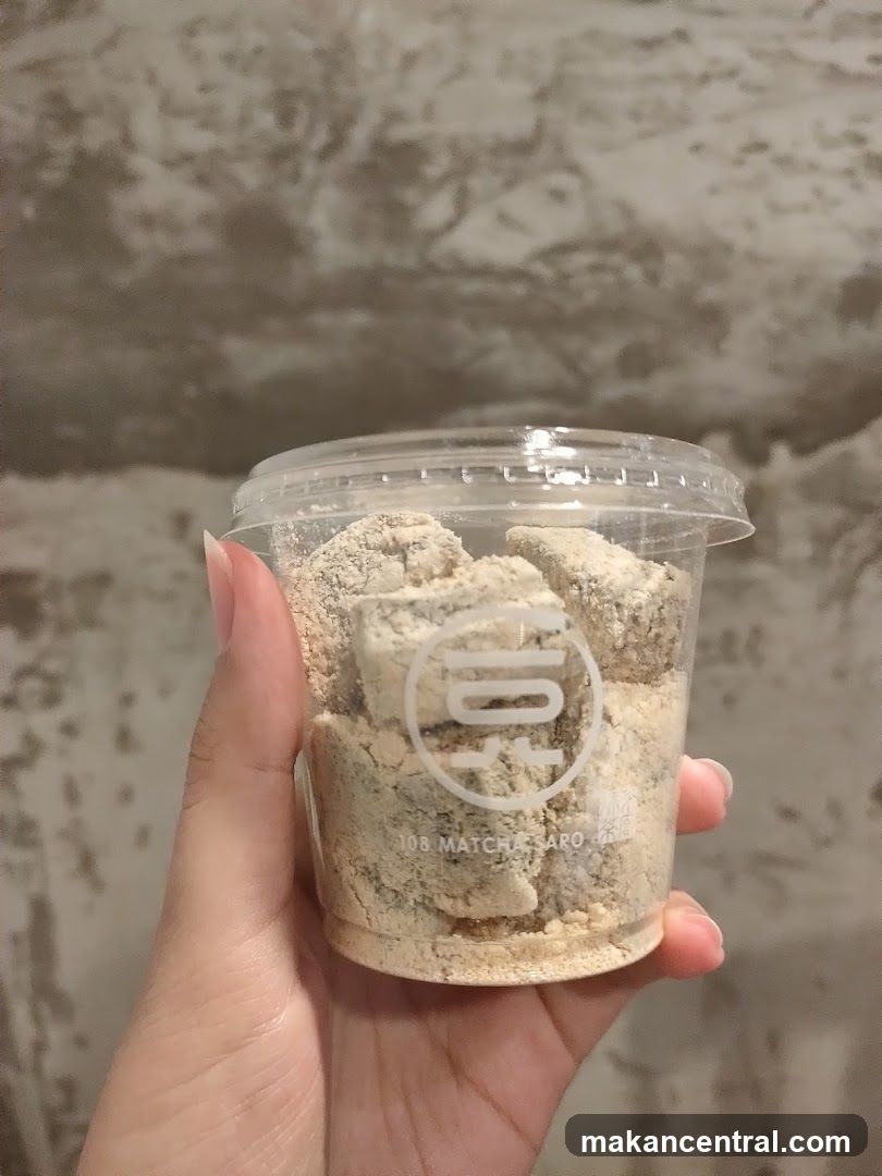 Hand holding matcha product
