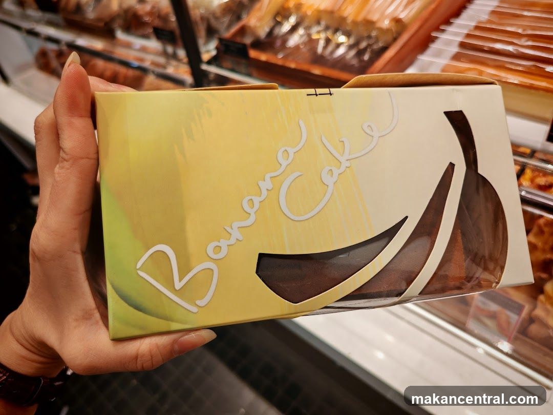 Banana Cake Box Held in Hand
