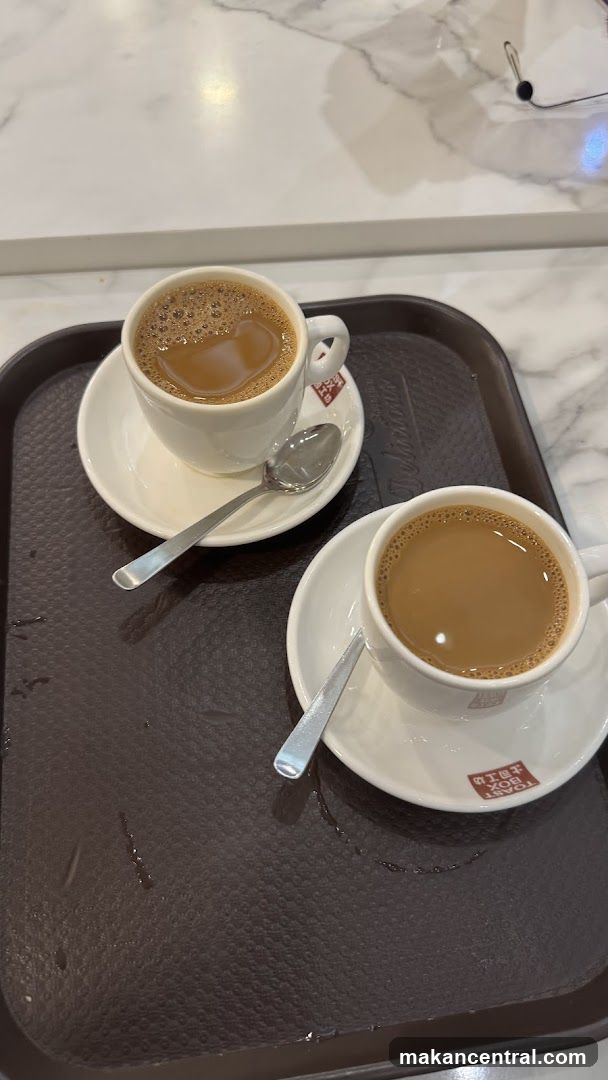 Two cups of tea on a tray