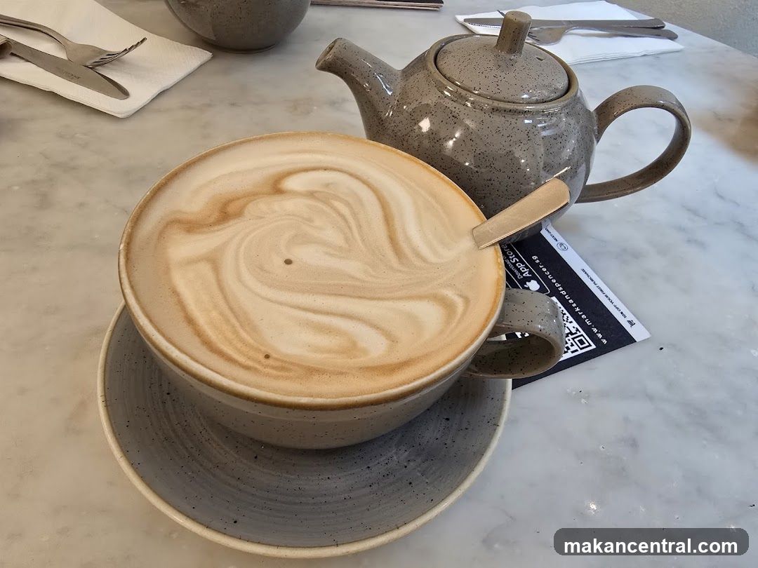 Coffee and Teapot on Marble Table