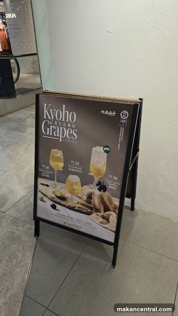 A promotional standee for Kyoho Grapes Series drinks