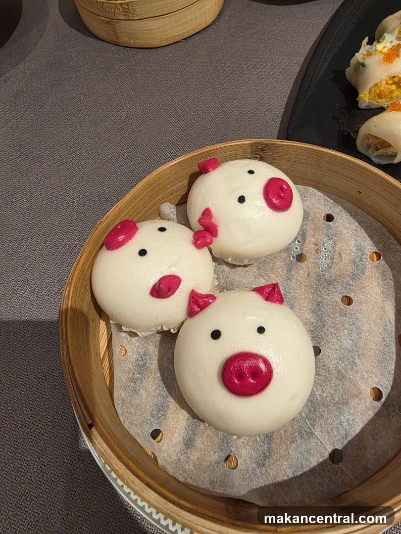 Pig-shaped dumplings in bamboo steamer