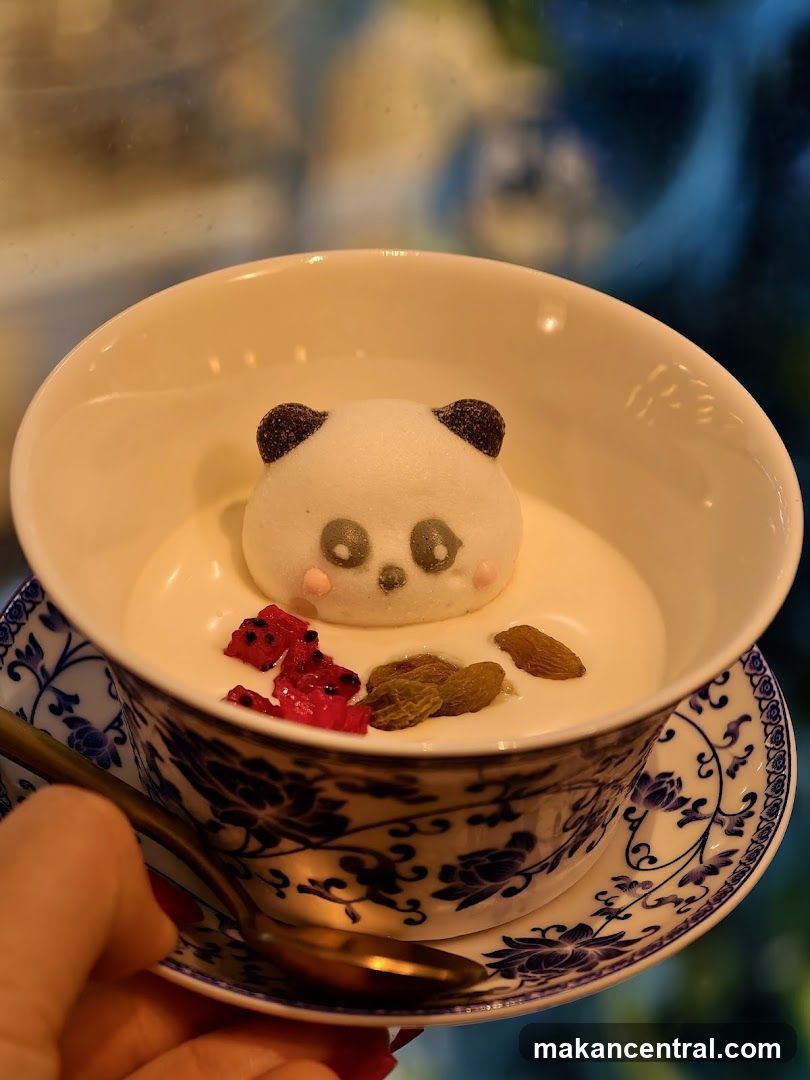 Panda-shaped dessert in ceramic cup
