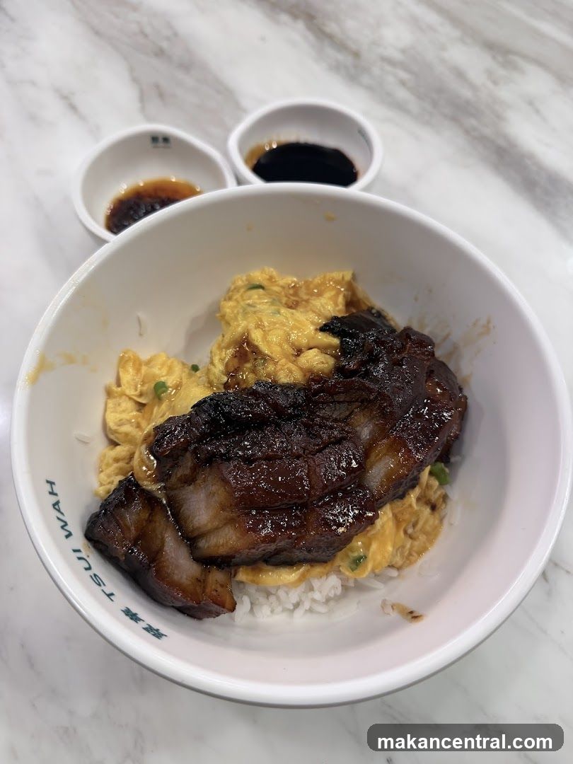 Rice bowl with braised pork and scrambled eggs