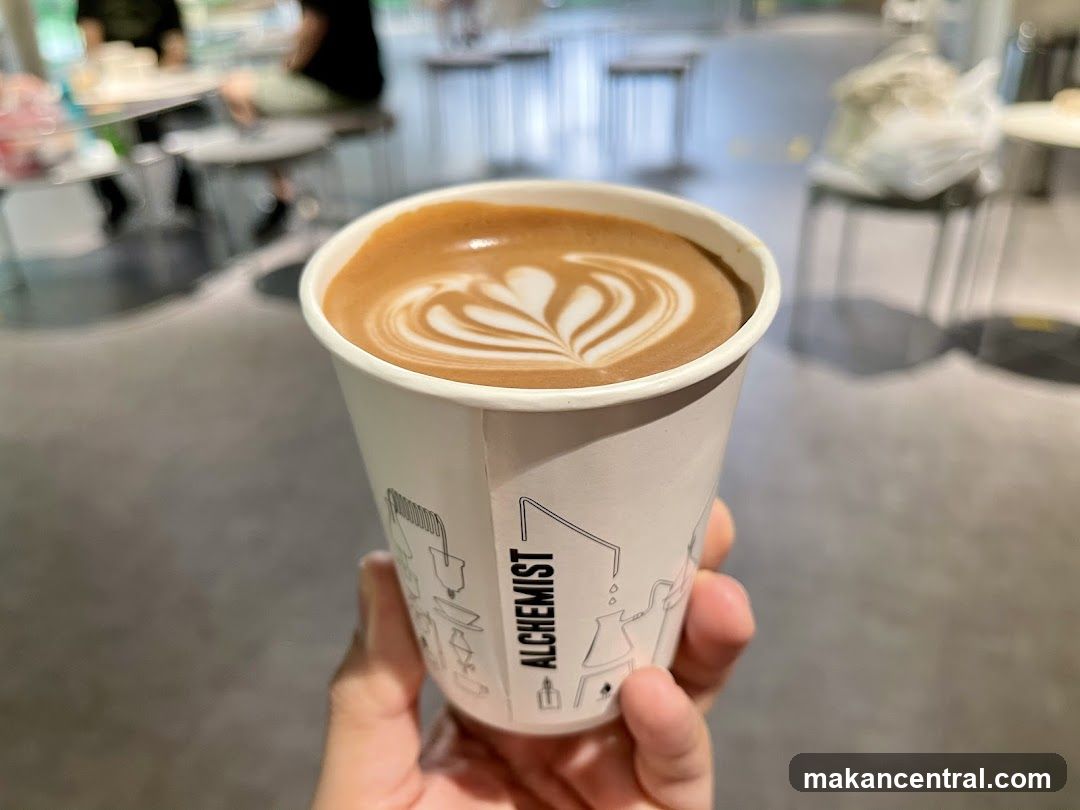 Coffee Cup Held in Hand