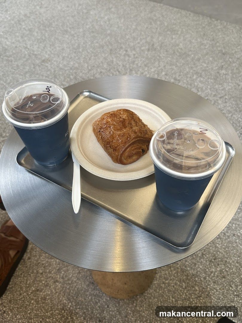 Coffee and pastry on tray