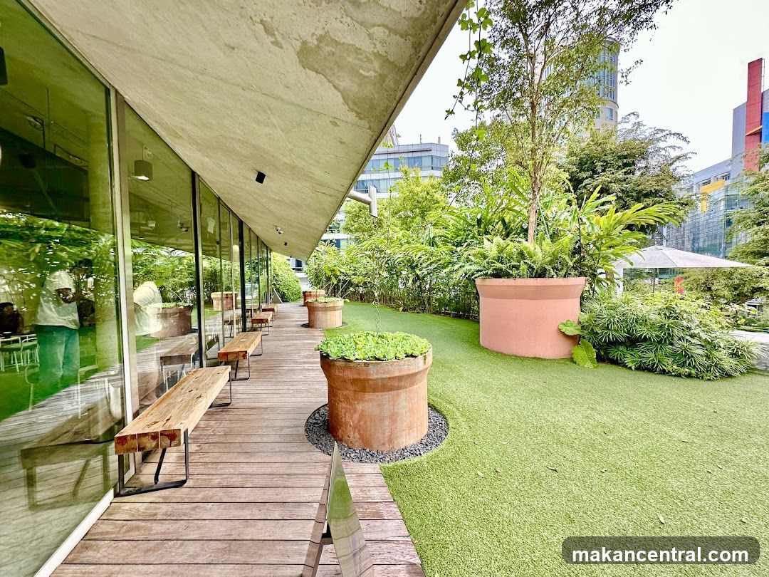 Outdoor seating area with greenery