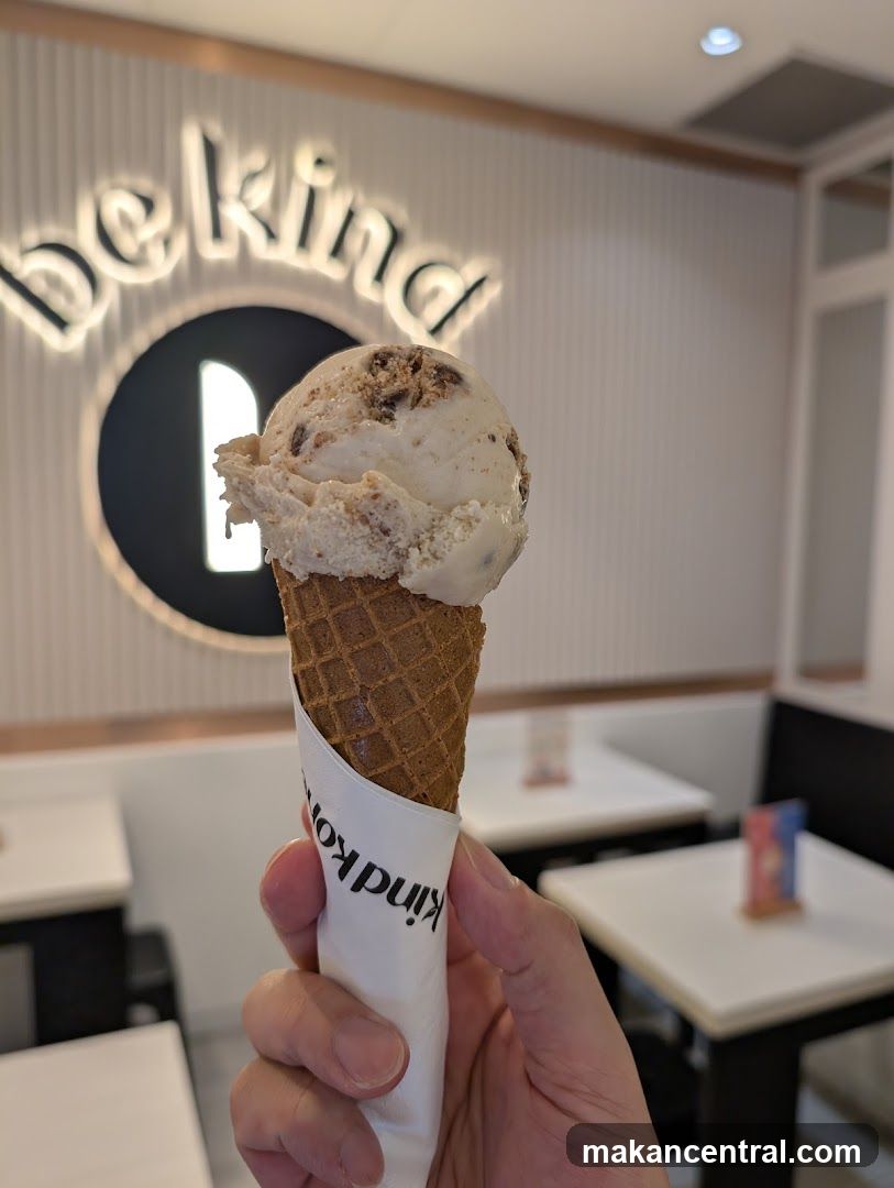 Ice cream cone held in hand