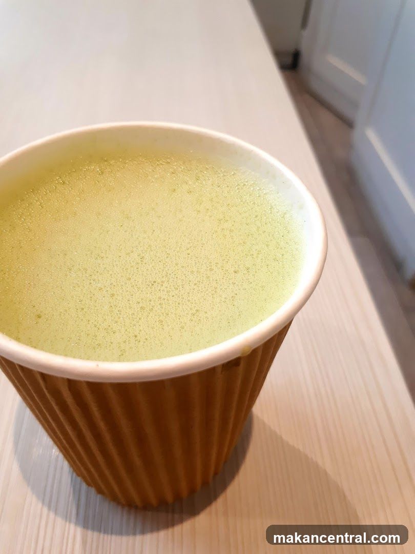 Matcha beverage in paper cup