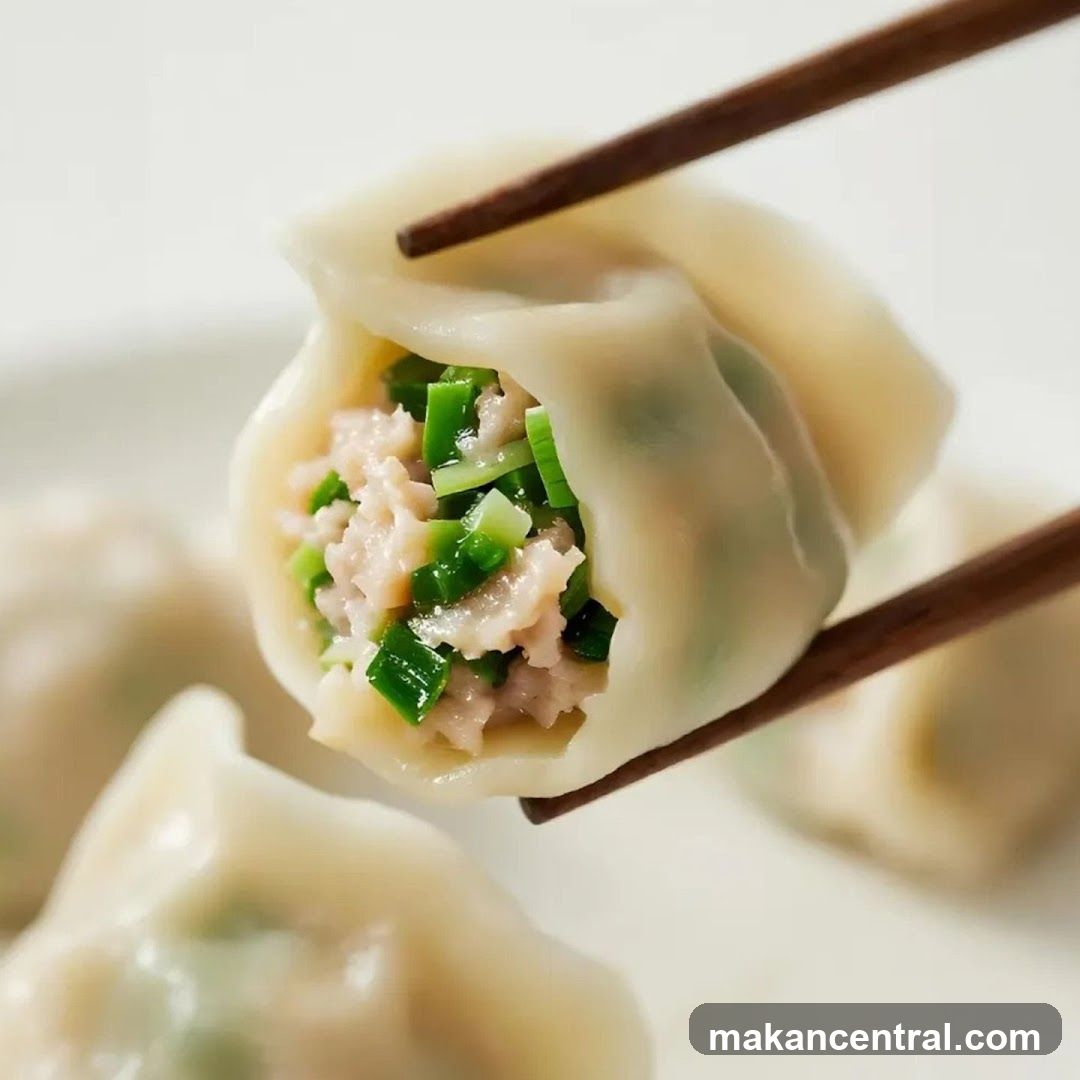 Dumplings Held by Chopsticks