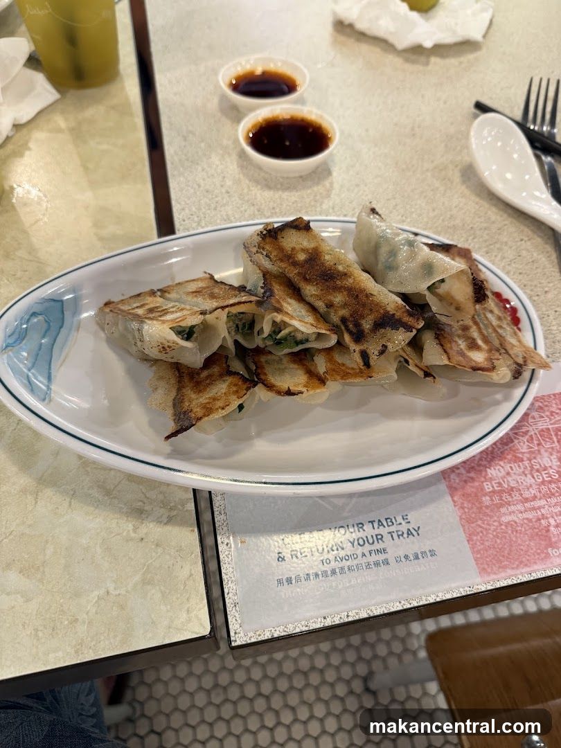Dumplings on Plate at Restaurant Table