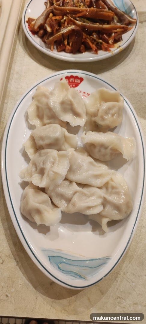 Dumplings and side dish on plates