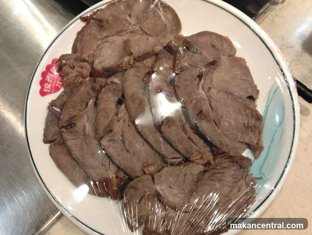 Sliced meat on plate
