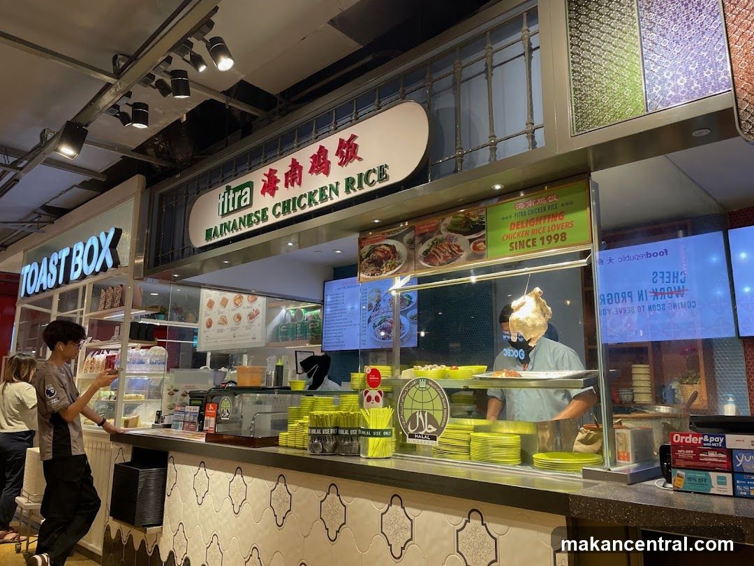 Inside a food stall with signage
