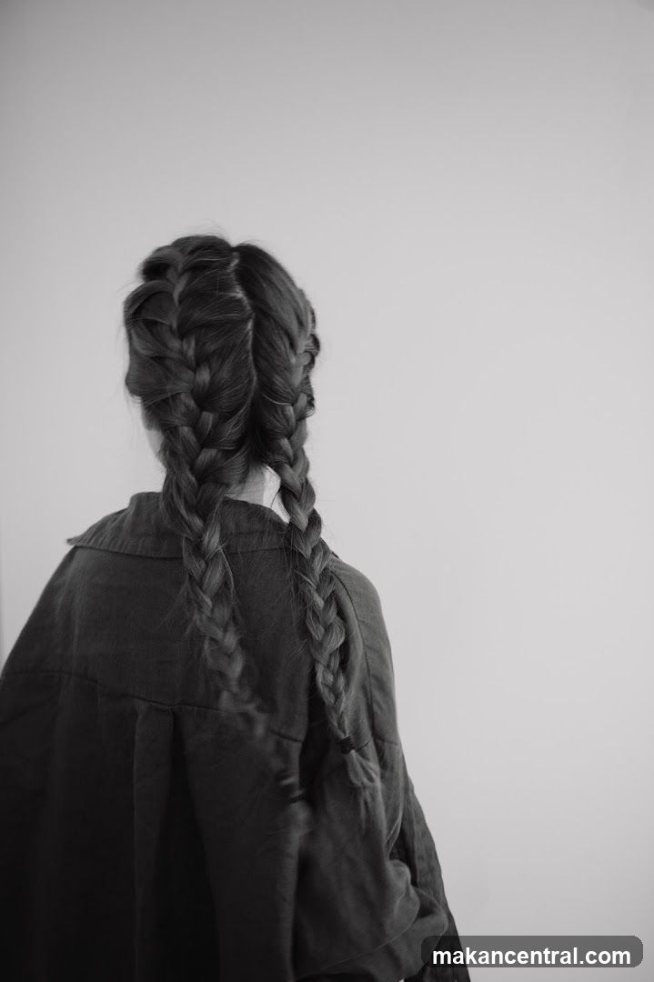 Back view of person with braided hair