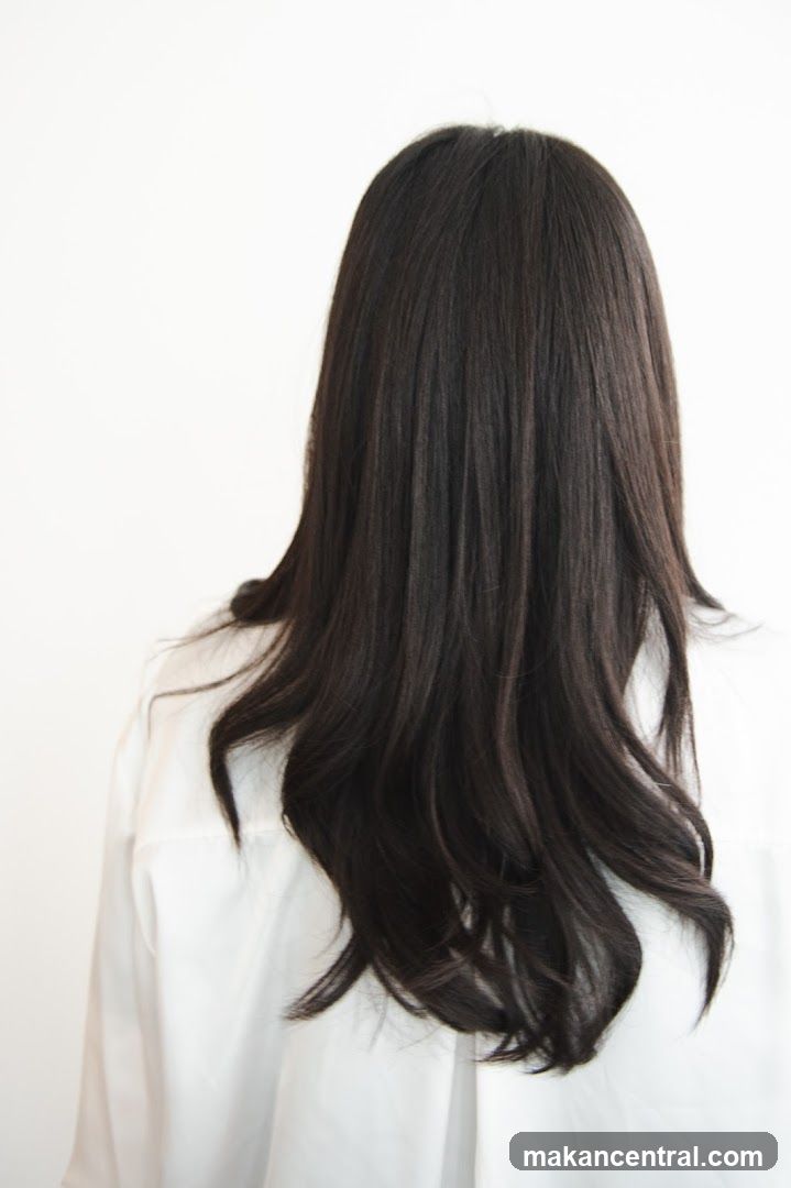 Back view of person with long dark hair