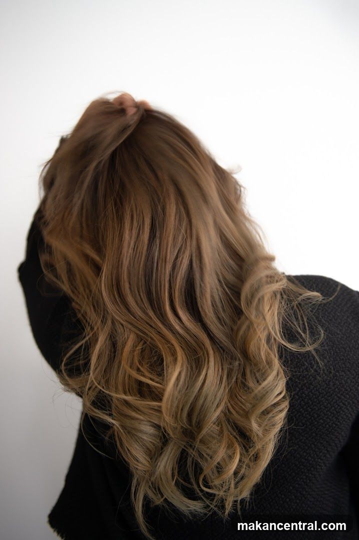 Back view of person with styled hair
