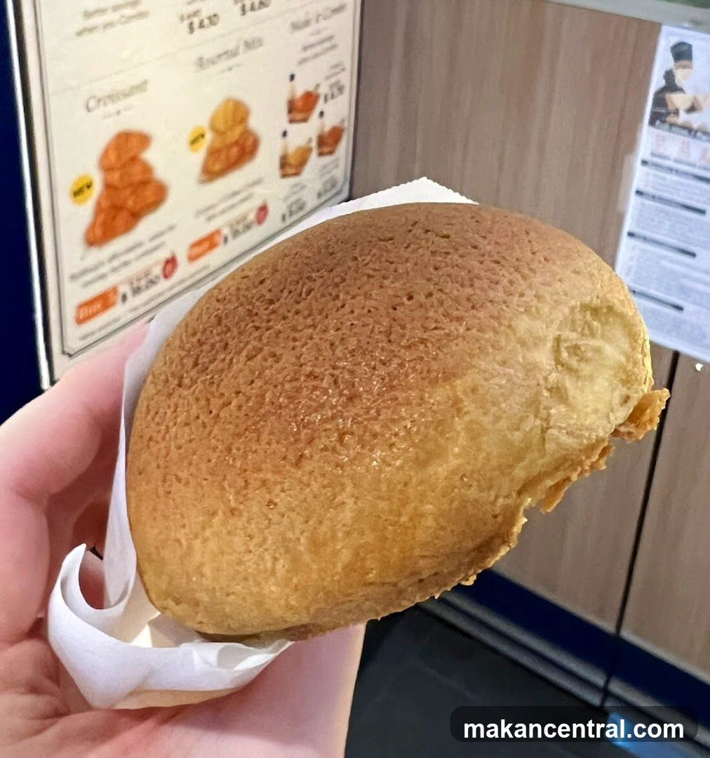 Hand holding a baked good