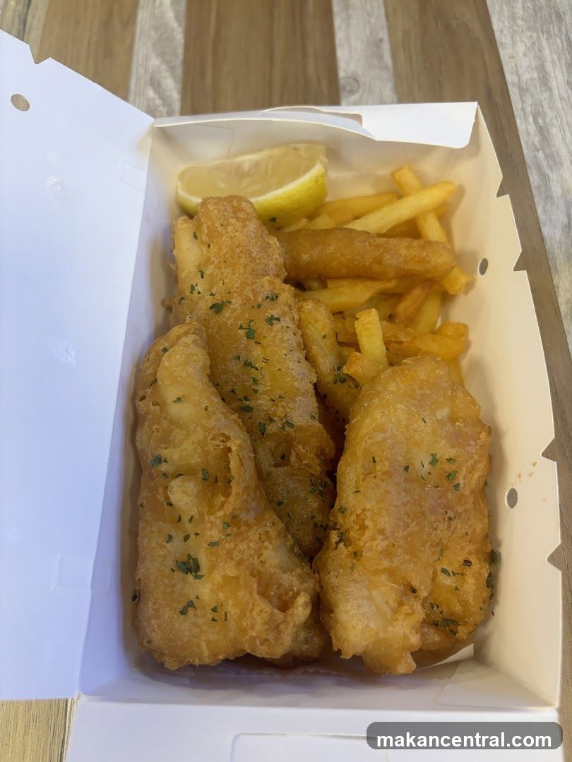 Fish and chips in takeout box