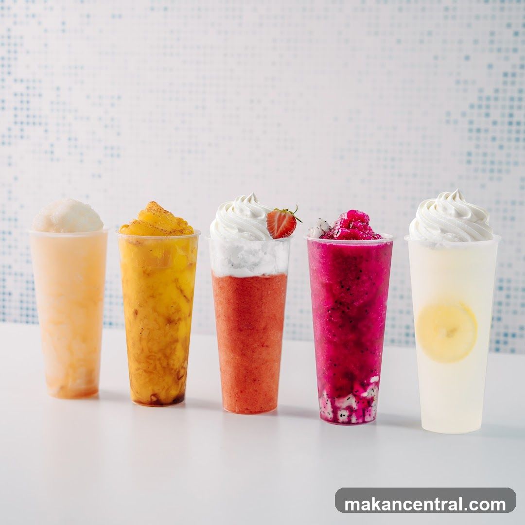 Five colorful beverages in cups
