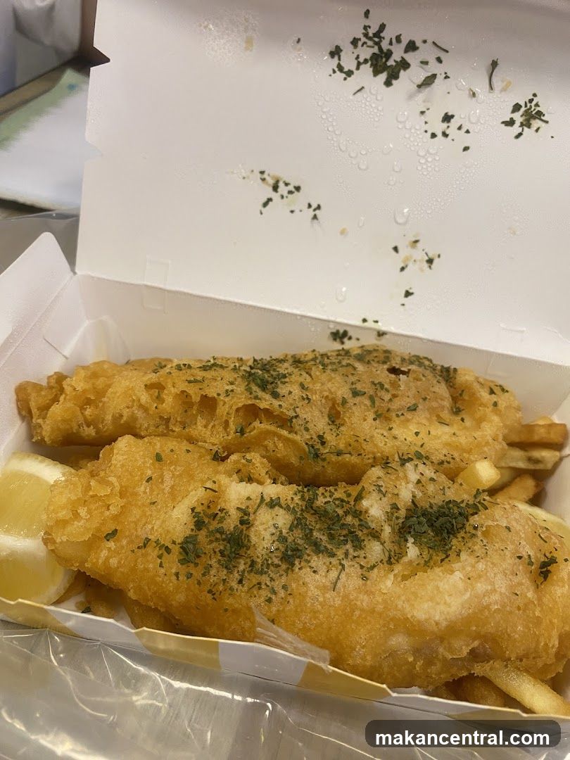Fish and chips in takeout box