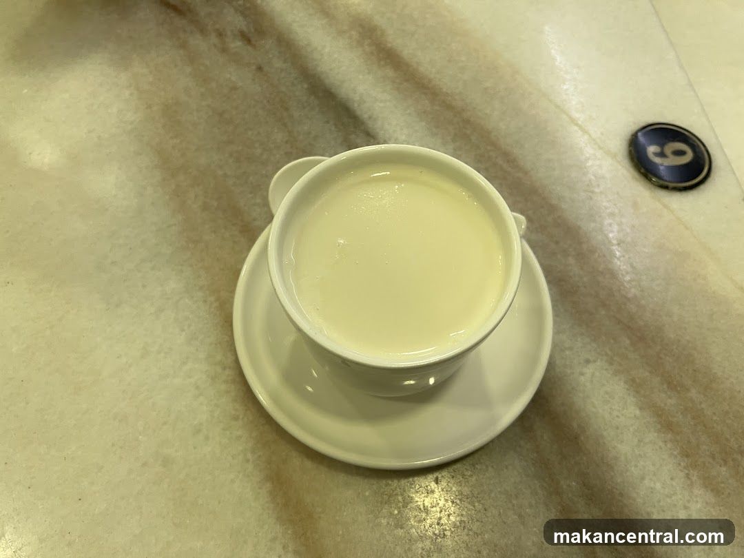 Cup of beverage on marble surface